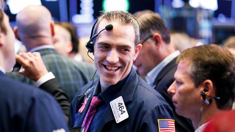 US markets seen lower after Fed hints at future rate hikes