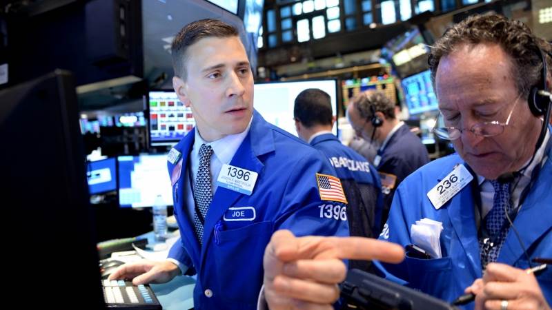 Wall Street opens lower amid jobs report, OPEC meeting