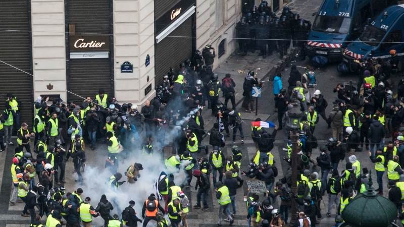 Police, protesters clash in Paris, over 200 arrested