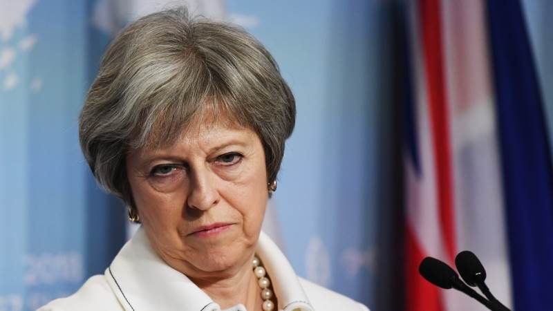 May to postpone Brexit vote - report