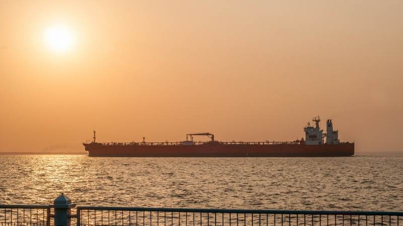 Oil trades lower amid reduced trade deal hopes