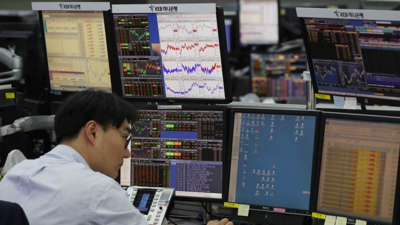Asian markets mostly higher as China, US talks continue