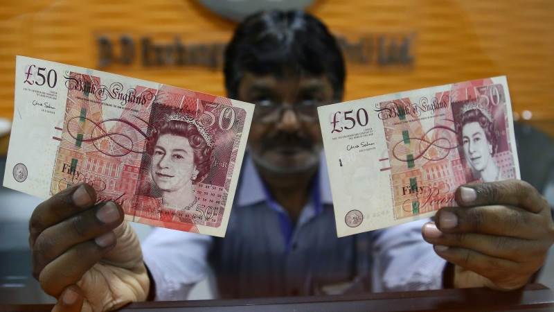 Pound rises on Brexit delay report