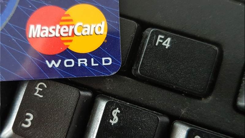China to open market to Visa, Mastercard - report