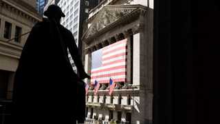 Wall Street closes in red amid COVID-19 concerns