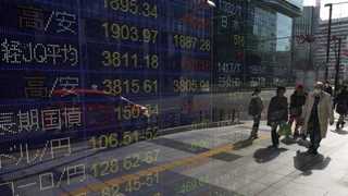 Most Asian stocks lower with data, Middle East tensions in focus