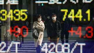 Asia mixed on inflation worries