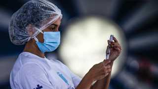 Brazil sees 98,832 new virus cases, 2,495 deaths