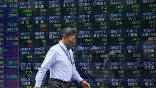 Asia trades lower after Japan economy reports