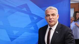 Lapid thanks Trump for easing Israel, UAE reactions