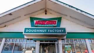 Krispy Kreme starts trading at $16.30, below IPO price