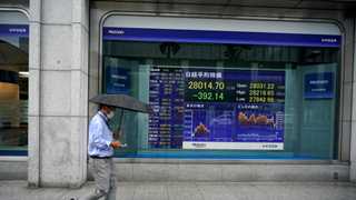 Asian markets trade mixed after China data