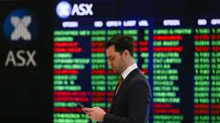 Asia-Pacific moslty lower following Wall Street record highs