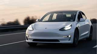 UBS raises Tesla price target to $725