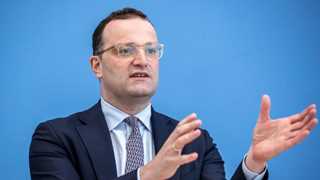 Spahn warns COVID restrictions may stay until 2022 – report