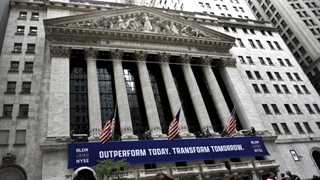 US opens mostly flat on fears of tapering