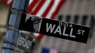 US closes higher on jobs data, debt limit deal