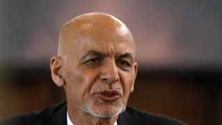 Ghani denies taking money before leaving country