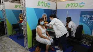 Israel offers booster shots to all vaccinated citizens