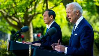 Japan outgoing PM Suga to meet Biden this month – report