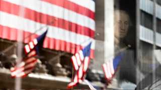 US opens higher amid economic updates