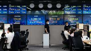 Asian stocks lower after oil prices stoke inflation fears