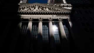 Nasdaq turns positive on debt limit optimism