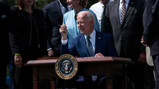 Biden inks declaration to raise refugee  cap to 125K