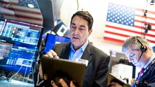 US closes mostly higher as Fed sets taper plans