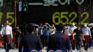 Asian shares muted on property sector worries