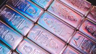 Precious metals advance, silver surges over 2%