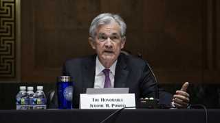 Fed bans officials from owning stock, limits trading