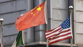 US govt warning firms about working with China