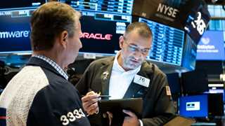 Dow, S&P descend from records on Powell’s remarks