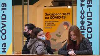 Russia posts new records in daily virus deaths, cases