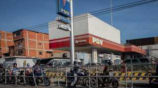 Venezuela hikes gasoline prices citing currency change