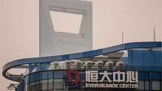 Evergrande to avoid default for a second time – report