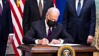 Biden signs bipartisan infrastructure bill into law