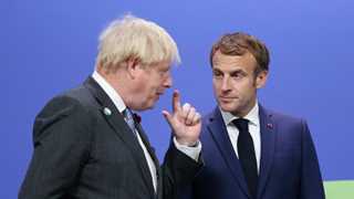 Johnson, Macron talk after 31 migrants die in Channel