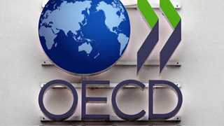 OECD cuts global GDP growth forecast for 2021