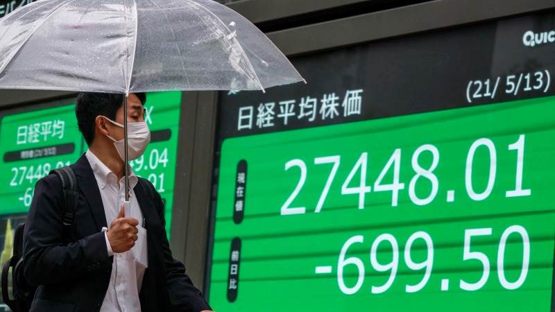 Asia traades lower after Fed minutes