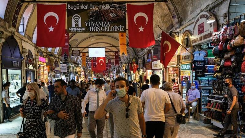 Turkish central bank cuts rates, lira drops to new lows