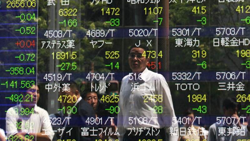 Asian markets trade lower after BoJ holds rates