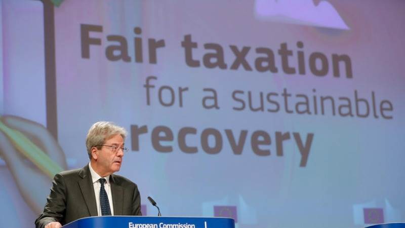 EU unveils directive on global corporate tax