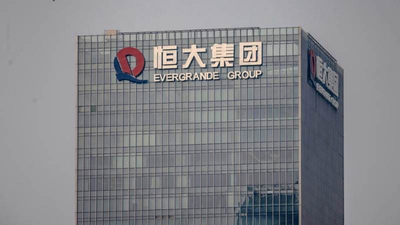 Evergrande ups target for unit delivery in December