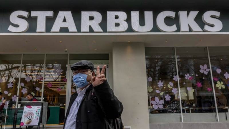 Starbucks staff to get vaccine or undergo weekly testing