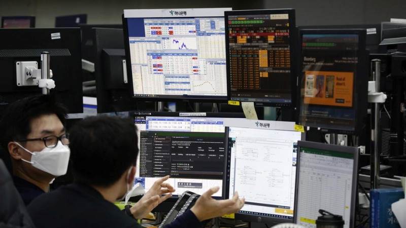 Asia trades mixed after data, earnings releases