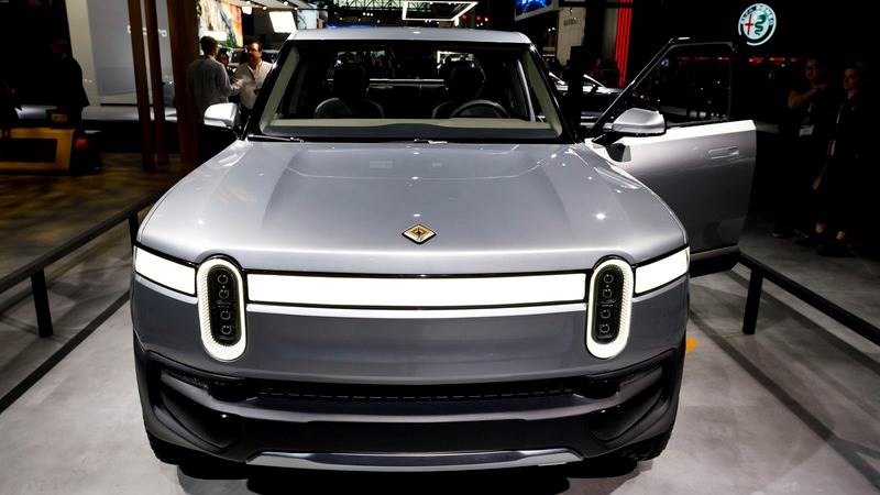 Rivian’s Q4 net loss sinks by almost 600% to $2.46B