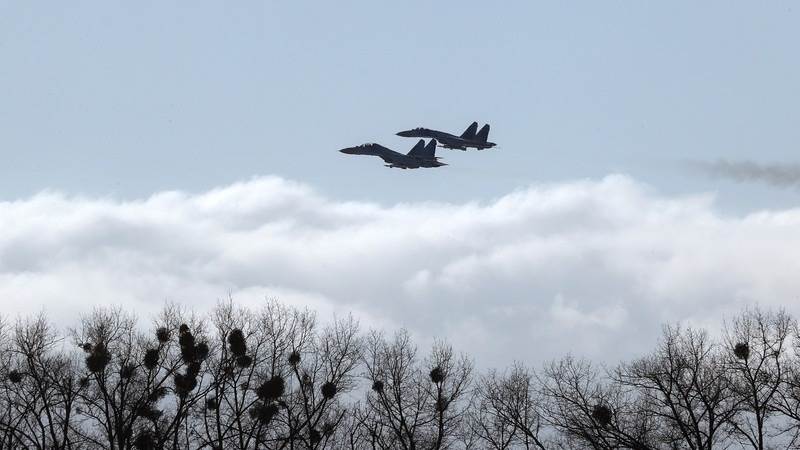 Air raid sirens, explosions heard in western Ukraine