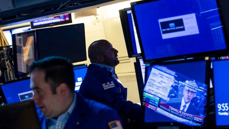 Dow soars, Nasdaq extends drop in choppy trade